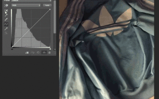 Is this Adidas Jacket Blue and White or Black and Brown?