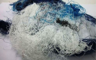 Lightweight wall panels made from waste textile fibres