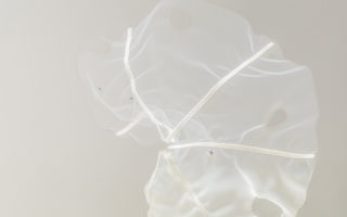 Lilies: bio-inspired hybrid textile changes shape in reaction to temperature