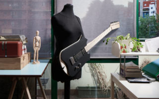 Navel guitar is made with 50,000 year old kauri wood