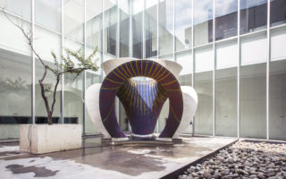 KnitCandela is a thin concrete shell made with knitted formwork