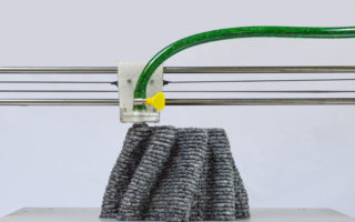Producing products with a paper pulp printer