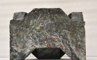 Stackable bricks made from recycled plastic