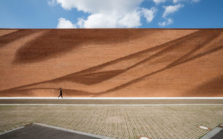 A brick façade inspired by fabric folds