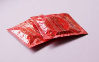 A self-lubricating condom