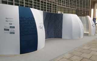 A digitally knitted pavilion made of recycled bottles