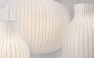 Lamps made of steel and cocooning material