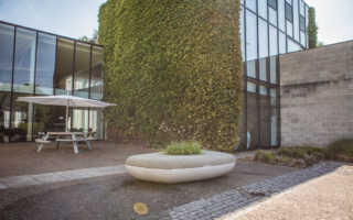 A rainwater collecting bench made with porous concrete