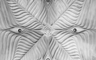 An acoustic, material saving aesthetic ceiling