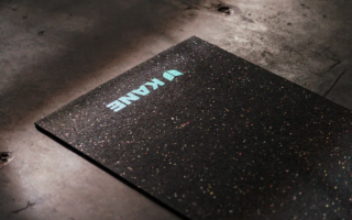 A yoga mat made of recycled shoes