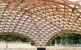 A bamboo-timber grid shell