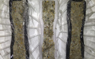 Insulation made of rice husks and newspapers