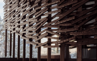 A façade of glass and pine wood