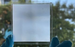 A transparent metamaterial for energy-efficient light and temperature regulation