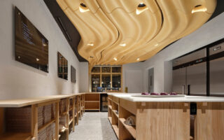 A ceiling made of CNC-milled hand-assembled pieces