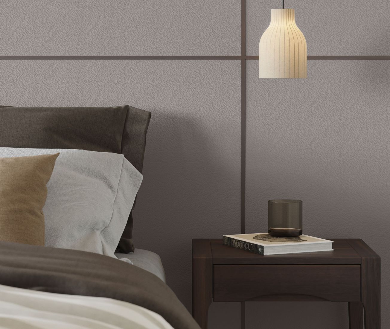 Bedroom wall clad in grained taupe leather panels with dark joints