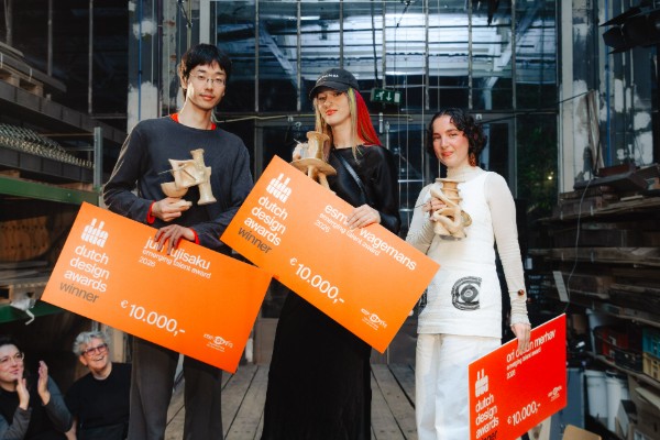 Jun Fujisaku, Esmay Wagemans and Ori Orisun Merhav holding their Emerging Talent Award cheques